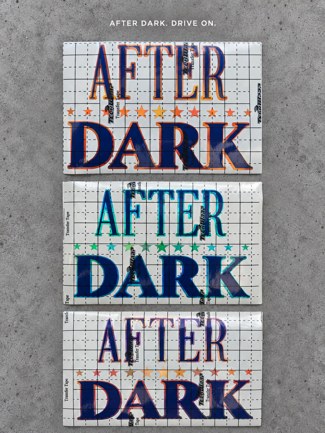 After Dark vinyl decal in three colours A, B and C under transfer tape on grey concrete